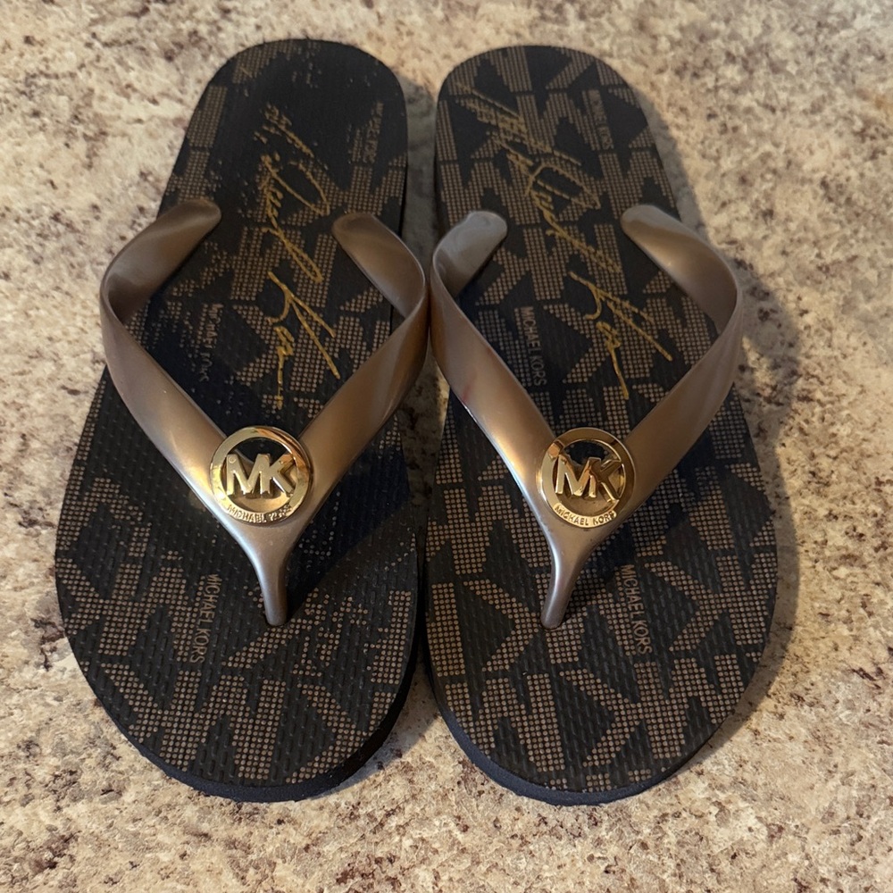 Michael Kors Black and Tan Women’s Flip Flops size 8.0 US